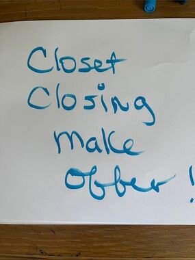 White Poster Board with Blue Handwriting